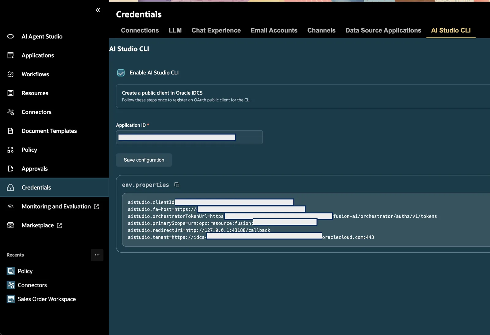 The AI Studio CLI tab showing the generated env.properties block with clientId, fa-host, orchestratorTokenUrl, primaryScope, redirectUri and tenant.